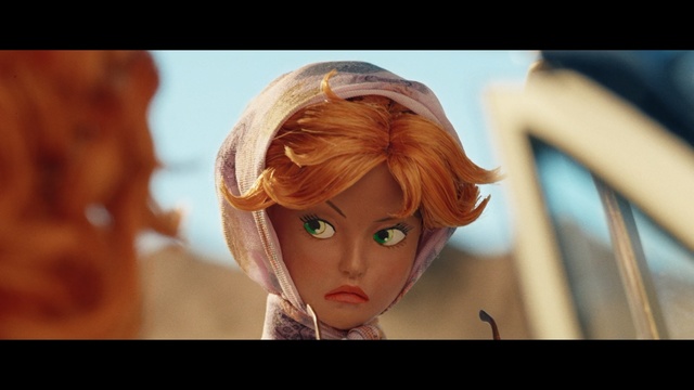 Video Reference: Hair, Face, Head, Hairstyle, Forehead, Blond, Eye, Doll, Cg artwork, Close-up, Person