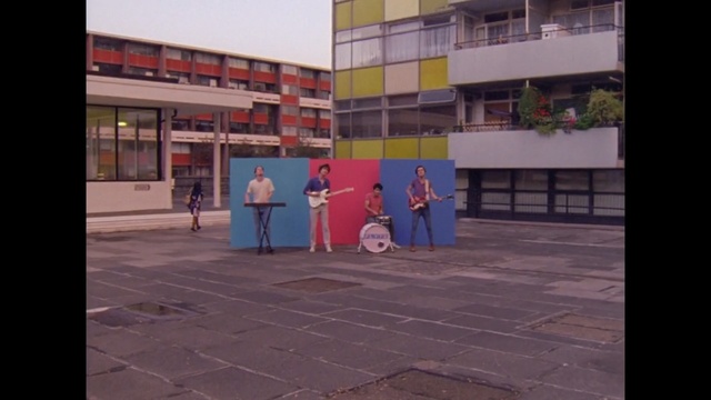 Video Reference: public space, urban area, neighbourhood, city, games, recreation, street, pedestrian, walkway, facade