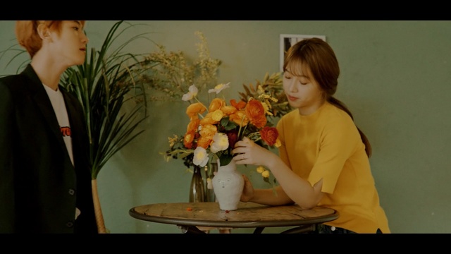 Video Reference: flower, yellow, floristry, flower arranging, plant, girl, floral design, conversation, screenshot, romance, Person