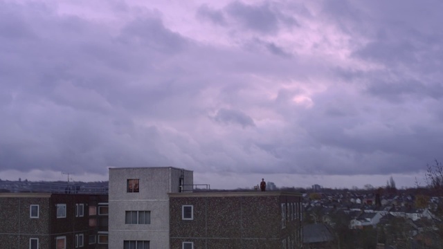 Video Reference: Sky, Cloud, Daytime, Cumulus, Atmosphere, Urban area, Atmospheric phenomenon, Residential area, Roof, Morning