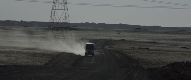 Video Reference: sky, road, rural area, ecoregion, field, tundra, landscape, plain, prairie, fog, Person