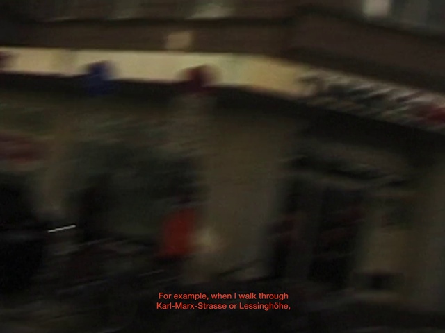 Video Reference: Automotive lighting, Automotive tire, Tints and shades, Font, Automotive exterior, Wood, Darkness, Auto part, Building, Glass