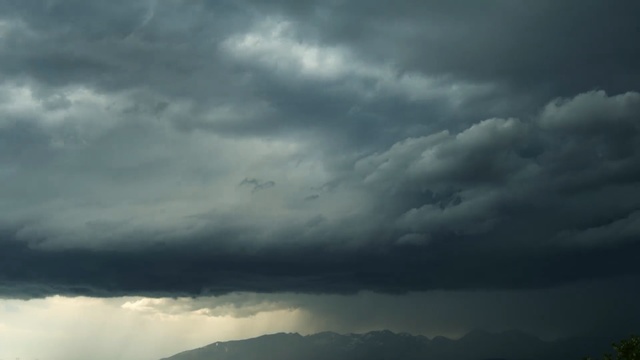 Video Reference: sky, cloud, atmosphere, cumulus, daytime, horizon, storm, meteorological phenomenon, highland, sunlight