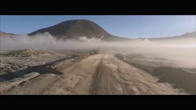 Video Reference: Mountainous landforms, Highland, Nature, Mountain, Sky, Atmospheric phenomenon, Mountain range, Ridge, Wilderness, Road