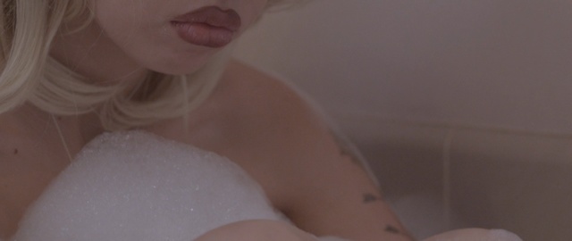 Video Reference: skin, human hair color, nose, lip, girl, close up, chin, cheek, neck, hand