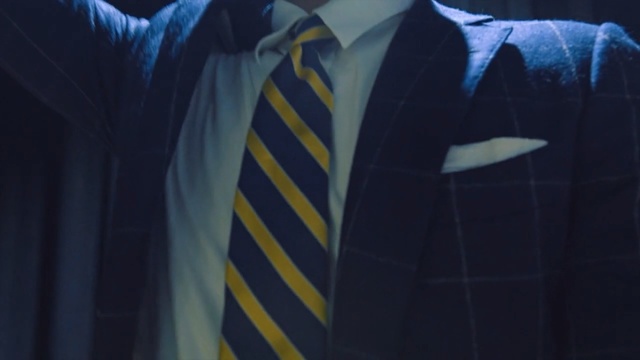 Video Reference: Blue, Yellow, Suit, Formal wear, Tie, Outerwear, Blazer, Gentleman, Collar, Jacket