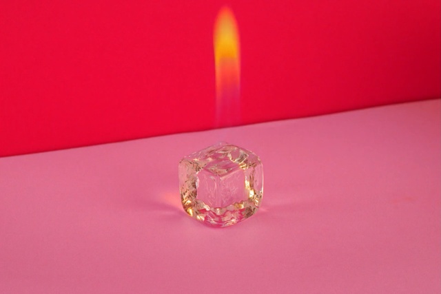 Video Reference: Pink, Lighting, Candle, Fashion accessory, Magenta, Ring, Candle holder, Crystal, Metal