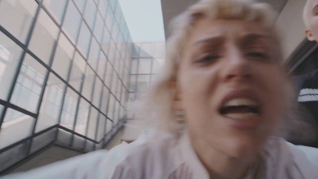 Video Reference: hair, face, facial expression, human hair color, nose, head, chin, girl, blond, forehead, Person