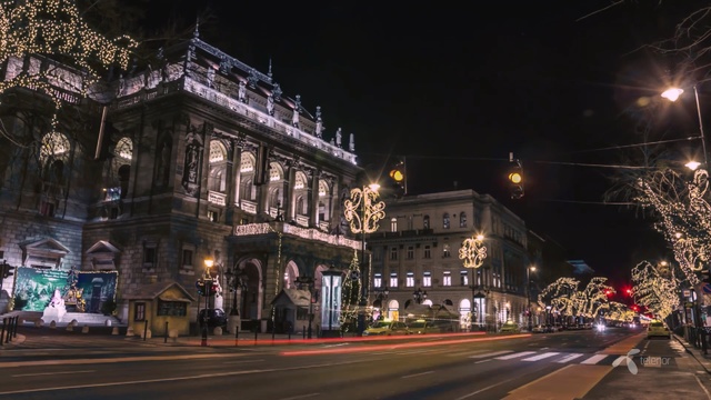 Video Reference: night, town, city, landmark, metropolis, urban area, infrastructure, metropolitan area, tree, downtown