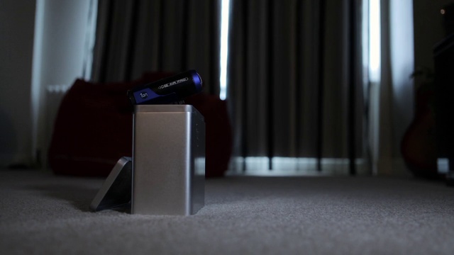 Video Reference: Light, Room, Audio equipment, Lighting, Photography, Material property, Floor, Interior design, Flooring, Electronic device