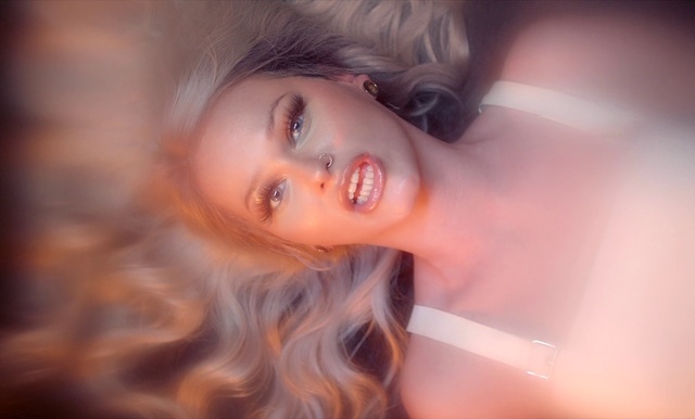 Video Reference: Nose, Lip, Eyebrow, Eyelash, Smile, Human body, Flash photography, Dress, Iris, Lipstick