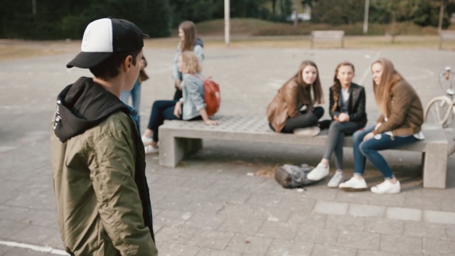 Video Reference: sitting, recreation, conversation, girl, kid, kids, friends, girls, girl, town, street, Person
