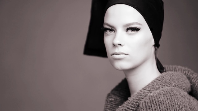 Video Reference: Face, Lip, White, Black, Eyebrow, Beauty, Skin, Head, Eye, Beanie, Person