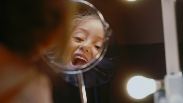 Video Reference: Nose, Cheek, Smile, Tooth, Eyelash, Jaw, Ear, Flash photography, Happy, Audio equipment