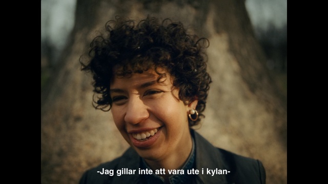 Video Reference: Hair, Face, Facial expression, Hairstyle, Forehead, Smile, Chin, Nose, Human, Cheek, Person