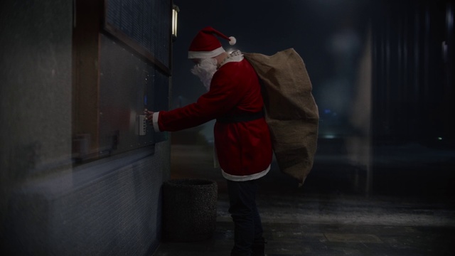 Video Reference: Red, Standing, Outerwear, Fictional character, Darkness, Headgear, Photography, Jacket, Night, Santa claus
