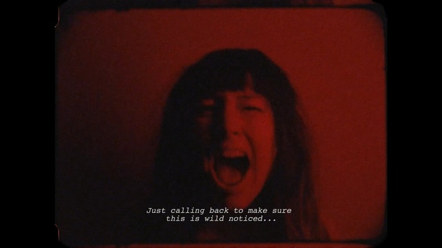 Video Reference: Red, Mouth, Text, Darkness, Room, Flesh, Fiction, Font, Photography, Album cover, Person