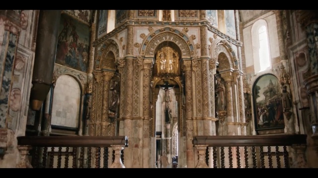 Video Reference: medieval architecture, gothic architecture, building, cathedral, historic site, place of worship, church, chapel, religious institute, arch, Person