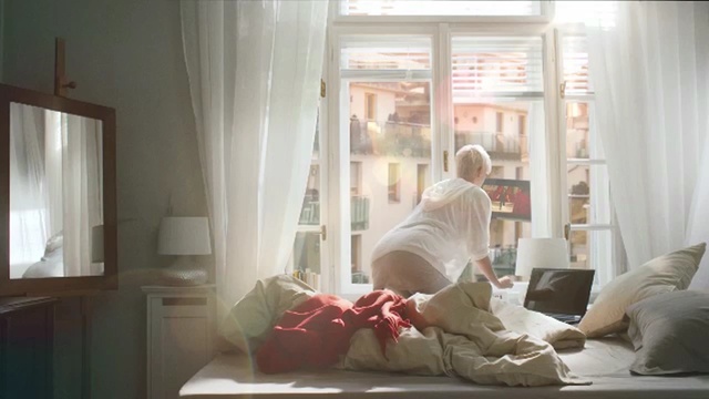 Video Reference: room, window, interior design, furniture, home, textile, curtain, window treatment, girl, window covering, Person