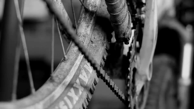 Video Reference: black, black and white, monochrome photography, tire, automotive tire, photography, close up, monochrome, spoke, metal, Person