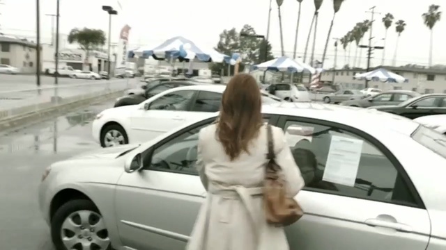 Video Reference: land vehicle, car, vehicle, family car, luxury vehicle, mid size car, mode of transport, automotive design, full size car, vehicle door, Person