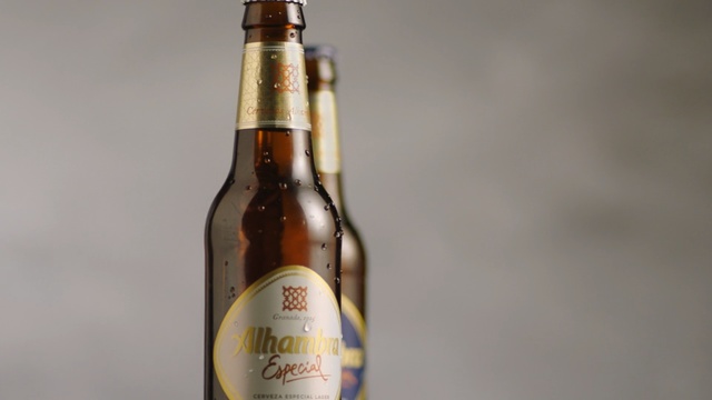 Video Reference: beer bottle, beer, drink, alcoholic beverage, bottle, glass bottle, lager, alcohol, wheat beer