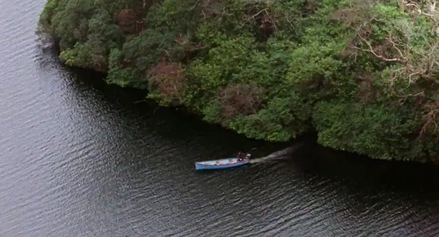 Video Reference: channel, body of water, river, water, boat, kayak, landscape, mountain, canoe, forest, rock, travel