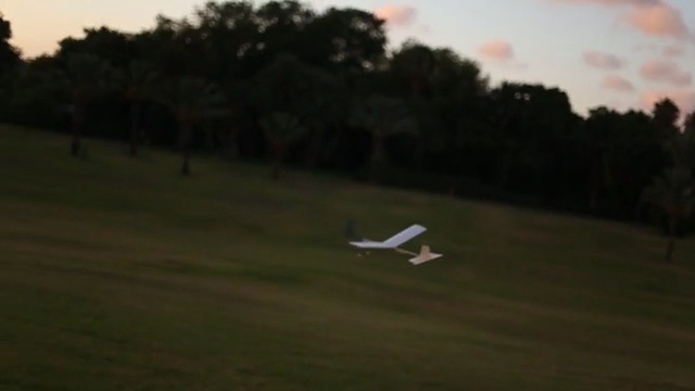 Video Reference: Airplane, Model aircraft, Nature, Aircraft, Radio-controlled aircraft, Gliding, Flight, Grassland, Vehicle, Glider