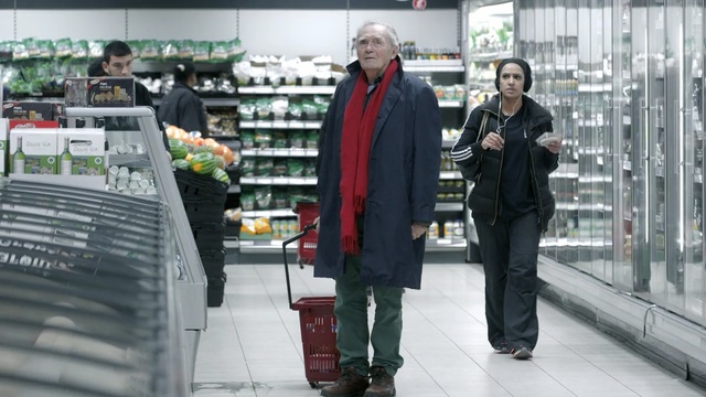 Video Reference: outerwear, product, supermarket, suit, retail, Person