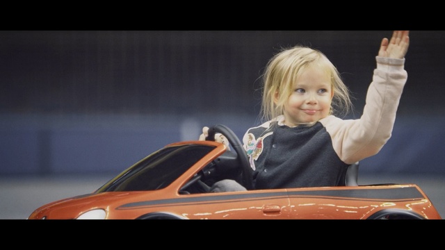 Video Reference: car, photography, automotive design, sitting, girl, child, fun, smile, vehicle, Person