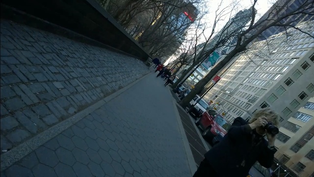 Video Reference: urban area, sky, infrastructure, architecture, structure, building, tree, city, metropolitan area, roof, Person