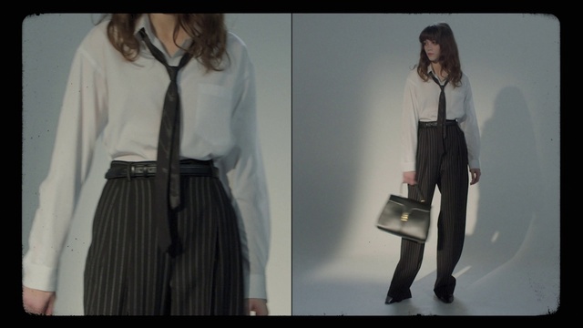 Video Reference: Clothing, White, Black, Shoulder, Fashion, Waist, Shirt, Suspenders, Neck, Blouse