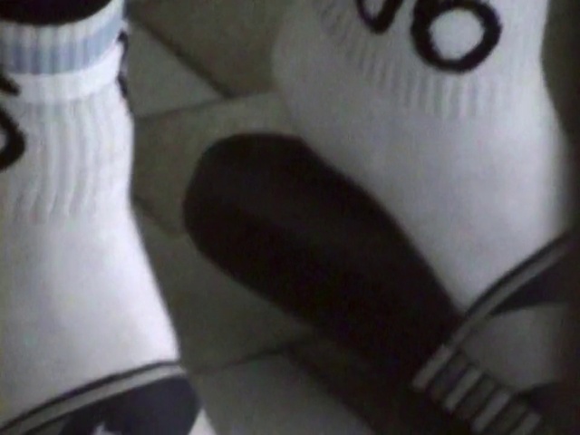 Video Reference: White, Footwear, Shoe, Leg, Finger, Ankle, Hand, Human leg, Sportswear, Sock