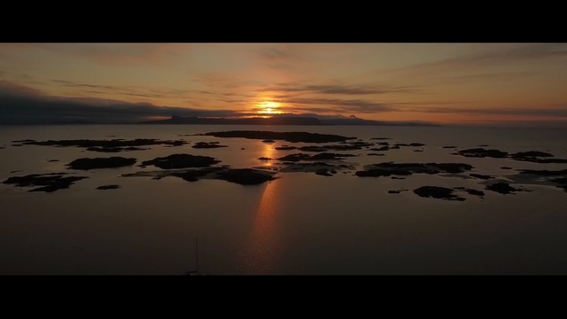 Video Reference: sky, reflection, horizon, sun, sunset, sunrise, water, sea, calm, atmosphere