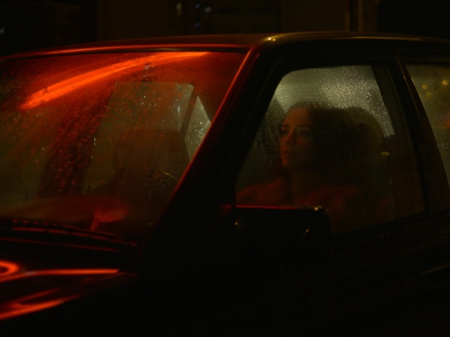 Video Reference: car, reflection, motor vehicle, red, mode of transport, light, automotive lighting, automotive design, night, windshield