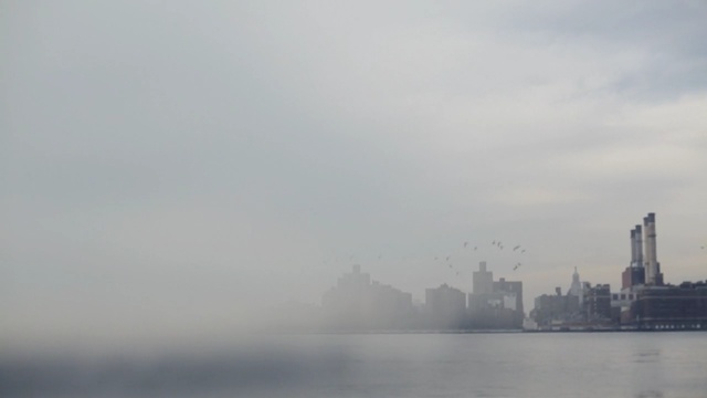 Video Reference: fog, waterway, skyline, sky, water, daytime, haze, mist, morning, city
