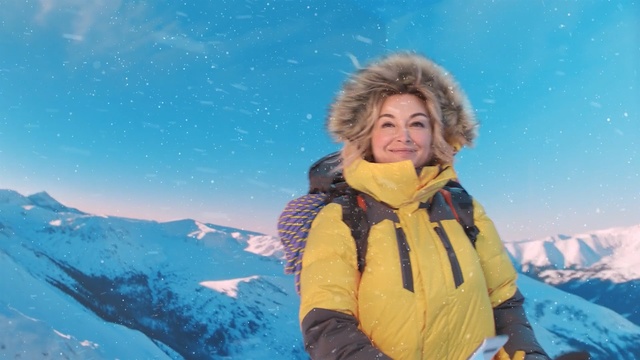 Video Reference: Mountainous landforms, Sky, Mountain, Fun, Winter, Snow, Outerwear, Mountain range, Summit, Vacation