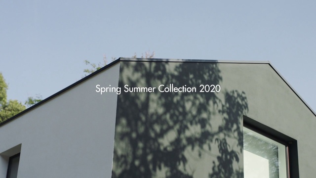 Video Reference: Wall, Architecture, Facade, Sky, Roof, Glass, Building, Shade, Advertising, Material property