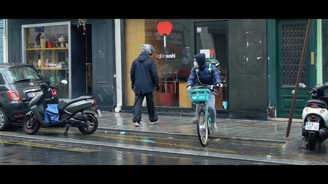 Video Reference: Mode of transport, Vehicle, Snapshot, Urban area, Moped, Street, Motorcycle, Rain, Bicycle