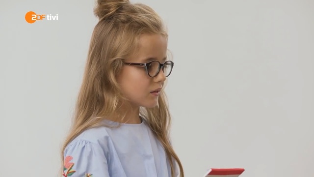 Video Reference: Hair, Eyewear, Glasses, Hairstyle, Blond, Shoulder, Joint, Ear, Child, Vision care, Person