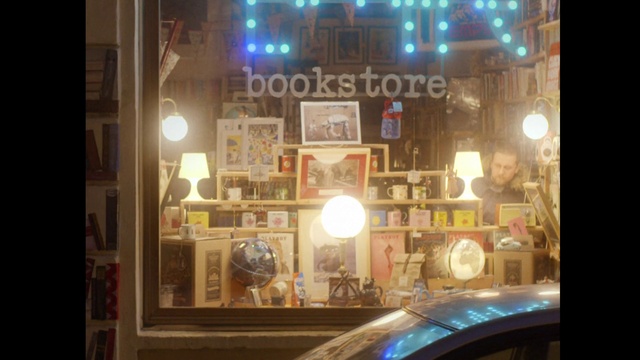 Video Reference: Lighting, Window, Building, Display window, Glass, Interior design, Display case, Art