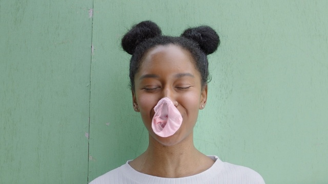 Video Reference: face, facial expression, nose, head, chin, forehead, hairstyle, cheek, mouth, ear, Person