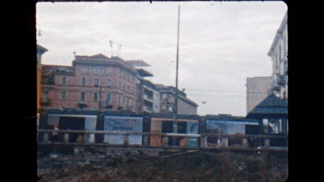 Video Reference: Transport, Town, Sky, Architecture, Residential area, Building, House, Suburb, Square, City