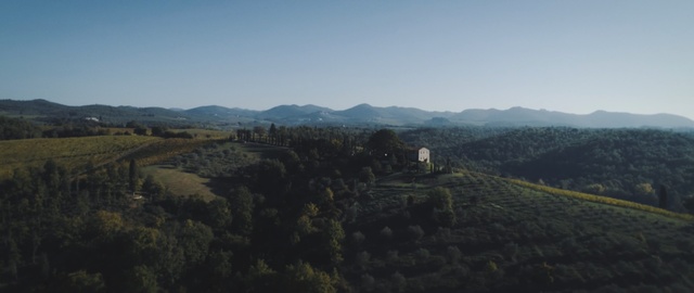 Video Reference: sky, mountainous landforms, hill, ridge, tree, highland, hill station, mountain, rural area, morning