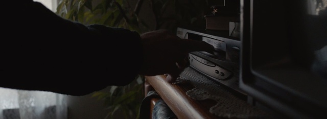 Video Reference: Vehicle door, Firearm, Automotive exterior, Bumper, Automotive design, Hand, Gun, Technology, Windshield, Automotive window part