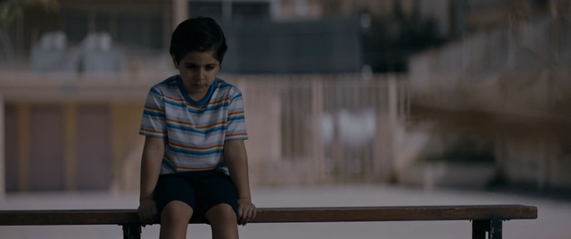 Video Reference: snapshot, girl, sitting, outerwear, human, fun, darkness, Person