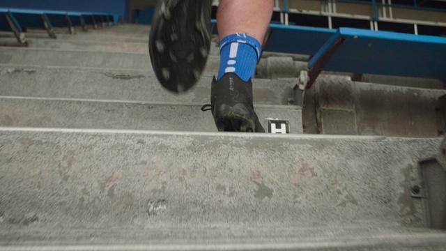 Video Reference: Footwear, Human leg, Tire, Automotive tire, Leg, Shoe, Wheel, Recreation, Rolling, Auto part, Person, Outdoor, Building, Road, Man, Jumping, Trick, Doing, Riding, Young, Sitting, Street, Woman, Standing, Blue, Holding, Board, Boy, Air, Walking, Wearing, City, Ramp, Hydrant, Suitcase, Luggage, Parking, White