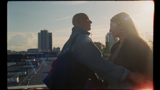 Video Reference: Sky, Atmospheric phenomenon, Reflection, Photography, City, Cloud, Skyline, Backlighting, Screenshot, Gesture
