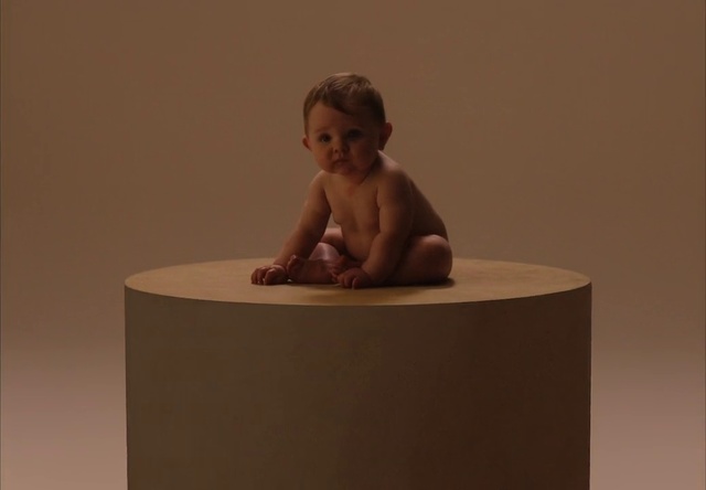 Video Reference: Child, Toddler, Sitting, Museum, Trunk, Tourist attraction, Sculpture, Figurine, Art