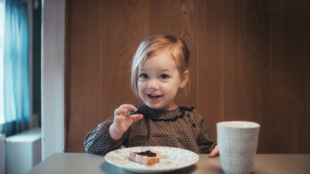 Video Reference: eating, girl, child, toddler, Person
